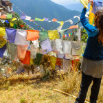 Hanging prayer flags in the wind