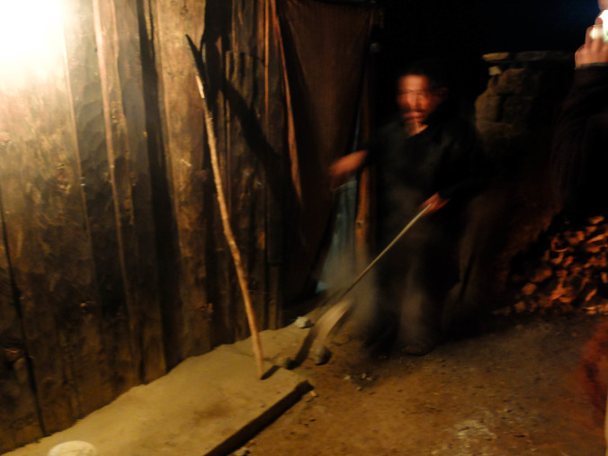 quickly transferring scalding stones to our wooden tubs